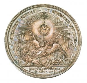 El reverso de esta moneda presenta una alegoría construida con el león, símbolo del Imperio español, y el águila mexicana, producto del sentimiento criollo del país.
